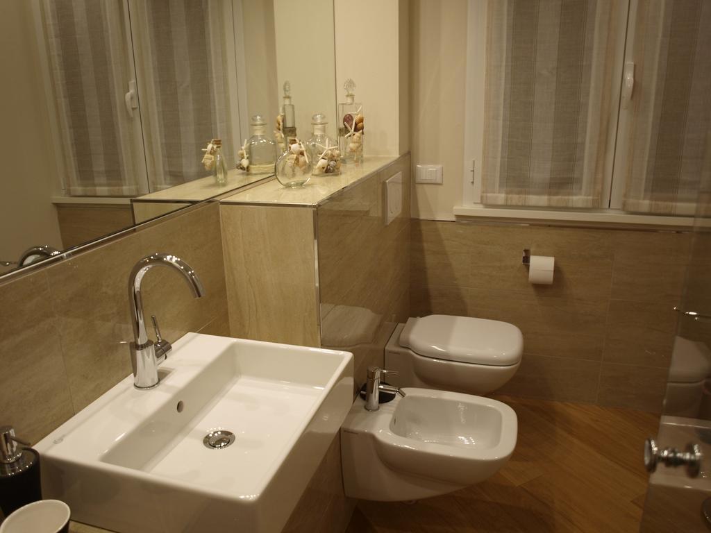 Il Pontile Holidays Apartment Marina di Pietrasanta Ruang foto