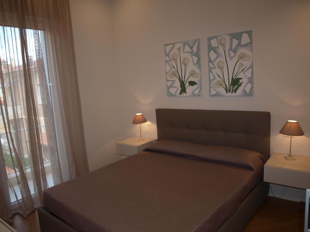 Il Pontile Holidays Apartment Marina di Pietrasanta Ruang foto